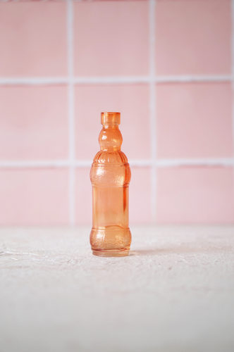 BOTELLA VIDRIO MEDIANA TEXTURA NARANJA