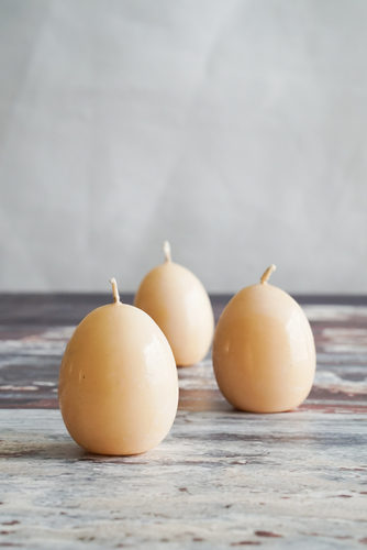 VELAS BEIGE FORMA DE HUEVO