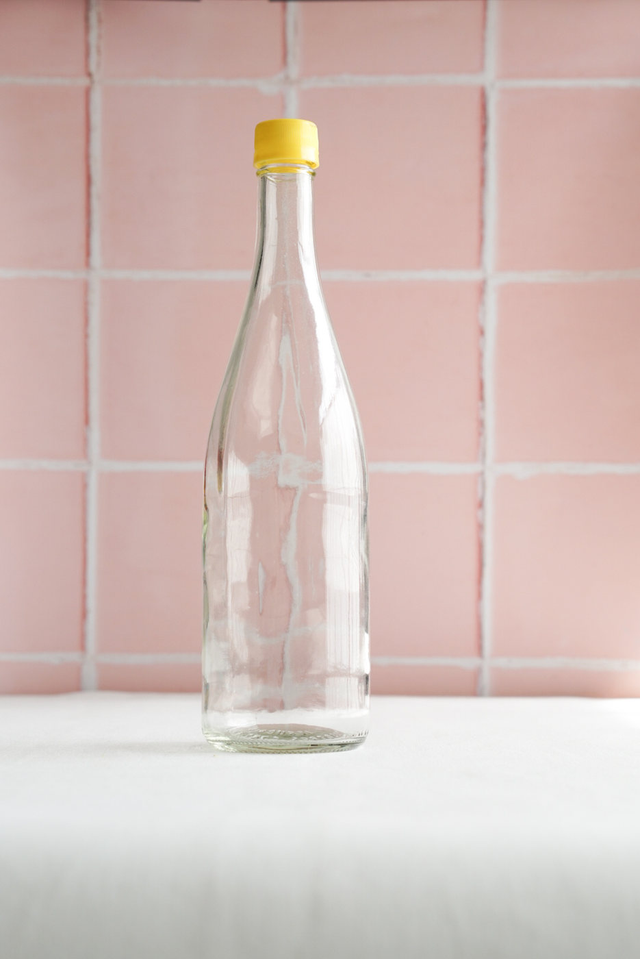 BOTELLA ALTA CON TAPA
